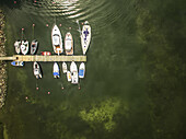 Aerial view of boats moored in the small harbour on island Vormsi in Estonia.