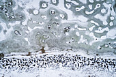 Abstract aerial view of frozen sea in Tallinn bay in Estonia.