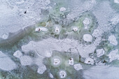 Abstract aerial view of the frozen sea in Muraste, Estonia.
