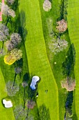 Aerial view of a golf course fairway and sand traps in early spring creating an abstract looking perspective at the Naperville Country Club in Napervile, IL - USA