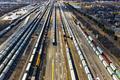 Aerial view of rail cars waiting at a staging railyard station in Aurora, IL - USA