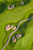 Aerial view of a golf course fairway and sand traps in early spring creating an abstract looking perspective at the Cantigny Golf Course in Wheaton, IL - USA