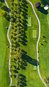 Aerial view of a golf course fairway and sand traps in autumn creating an abstract looking perspective at Arrowhead Golf Course in Wheaton, IL - USA