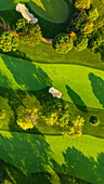 Aerial view of a golf course fairway and sand traps in autumn creating an abstract looking perspective at the Naperville Country Club in Napervile, IL - USA