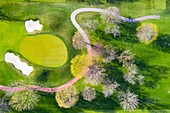 Aerial view of a golf course fairway and sand traps in early spring creating an abstract looking perspective at the Naperville Country Club in Napervile, IL - USA