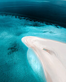 Aerial view of beautiful tropical island with white sand beaches and crystal clear turquoise waters, Alif Alif Atoll, Maldives.