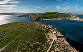Aerial view of Saint Paul statue and coastline in Mellieha, Malta.