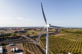 Aerial view of many wind turbines in a wind farm in countryside, La Muela, Zaragoza, Spain.