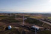 Aerial view of many wind turbines in a wind farm in countryside, La Muela, Zaragoza, Spain.