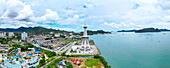Aerial view of maha tower amidst a beautiful cityscape and ocean, Kuah, Malaysia.