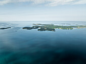Aerial view of Brijuni National Park, a group of islands along the Adriatic Sea coastline at sunset near Pula, Istria, Croatia.