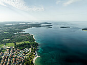 Aerial view of Fazana, a small town with a small harbour along the Adriatic Sea coastline, Istria, Croatia.
