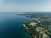 Aerial view of crystal clear sea water along the Adriatic Sea coastline in Porec, Istria, Croatia.