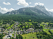 Aerial view of Cortina d'Ampezzo, a small town famous for winter holidays in Belluno province, Dolomites area, Veneto, Italy.