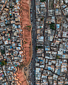 Aerial view of crowded rooftops and historic architecture in Sadar Bazar, Jaisalmer, India.