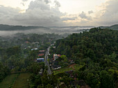 Aerial view of clouds in small village in the jungle close to Mathugama in Sri Lanka.