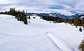 Aerial view of snowy mountains and ski area, Sorenberg, Lucerne, Switzerland.