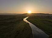 Aerial view of river at sunrise over Bani Gala, in Islamabad, Pakistan.