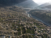 Aerial view of the spring blossom starting in Hunza Valley, Gilgit Baltistan, Pakistan, Karakoram range, Himalayas.