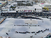 Pakistan - 16 March 2023: Aerial view of Tug of War game in Hunza Valley, Himalayas, Gilgit Baltistan, Pakistan.