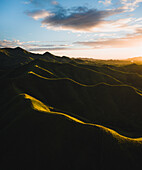 Aerial view of mountains at sunset at The Alicia Panoramic Park, Alicia, Bohol, Philippines