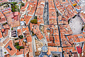 Aerial view of Burgos old town city center with red rooftop in typical European architecture style, Castilla y Leon, Spain.