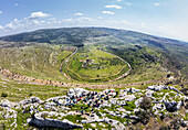 Aerial View of people admire the landscape of the wooded hills and the paths, Bi'r Saricah, Ramallah and al-Bireh Governorate, Palestine.