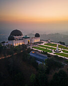 Aerial view of illuminated Griffith Observatory and scenic Los Angeles skyline, California, United States.