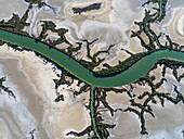 Aerial view of meandering river, sand, and mangrove in Accident Inlet, Gulf of Carpentaria, Karumba, Queensland, Australia.