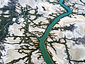 Aerial view of river network with tributaries, wetlands, and mangroves, Accident Inlet, Gulf of Carpentaria, Karumba, Queensland, Australia.