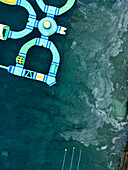 Aerial view of a beautiful water park with algae accumulation surrounded by the blue ocean, Pula, Croatia.