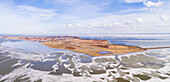Panoramic aerial view of the island / peninsula of Marken between the frozen Gouwzee and Markermeer after a long period of frost in February 2018, Noord-Holland, Netherlands