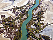 Aerial view of meandering river in serene Accident Inlet, Gulf of Carpentaria, Karumba, Australia.