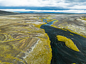 Aerial view of landscape with tephra and river at foot of Hekla volcano, Iceland.