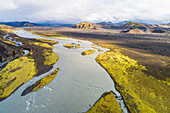 Aerial view of river Tungnaa between the mountains in beautiful sunlight, Fjallabak nature reserve, highlands of Iceland