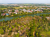 Aerial view of river Pa Sak, mixed forest and village Phra Non, Nakhon Luang, province of Ayutthaya, Thailand.