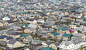 Aerial view of beautiful urban landscape with traditional architecture and residential houses, Derbent, Dagestan republic, Russia.