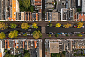 Aerial view of Amsterdam canal from top, view of several boat anchored along the river in city downtown, Amsterdam, The Netherlands.