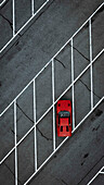 A top down aerial view of a Ferarri 308 GTI on a parking lot, Netherlands..