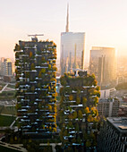 Aerial view of Bosco Verticale, Porto Nuova, Milan Italy, during sunset in spring.