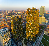 Aerial view of Bosco Verticale, Porto Nuova, Milan Italy, during sunset in spring.