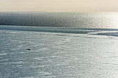 Aerial view of serene Lake Ladoga with tranquil blue waters and a vast horizon, Karelia Republic, Russia.