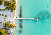 Aerial view of a broken jetty, inhabited island Vashafaru, Maldives, Haa Alif Atoll, Laccadive Sea.