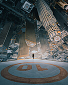 LA, USA - 13 March 2017: View of a person walking on an helicopter landing platform with Los Angeles skyline in background.