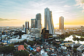COLOMBO, SRI LANKA - 02 JANUARY 2022: Aerial view of sunrise over skyscrapers in Colombo city center, Sri Lanka.