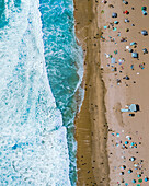 Aerial view of people on Manhattan beach, Los Angeles, California, United States.