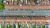 Aerial view of a residential street with terraced houses and cars, Bridgwater, United Kingdom.