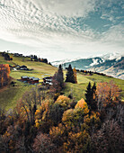 Aerial view of little houses and snowy peaks of Kaprun, Alps, Austria.