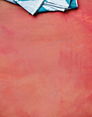 Napkin on a reddish background