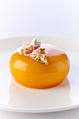 Calisson (French almond confectionery) with gold leaf and almonds